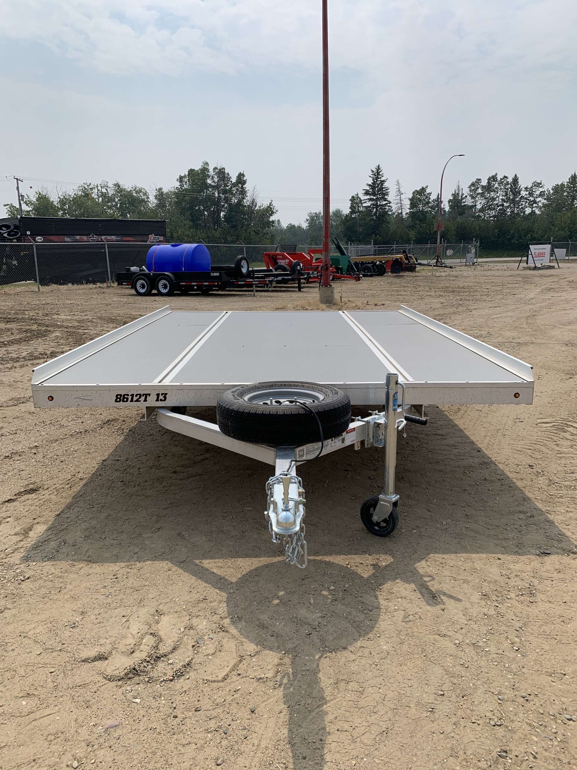 2025 Aluma 8'6" x 12' Tilt Toy Hauler Trailer