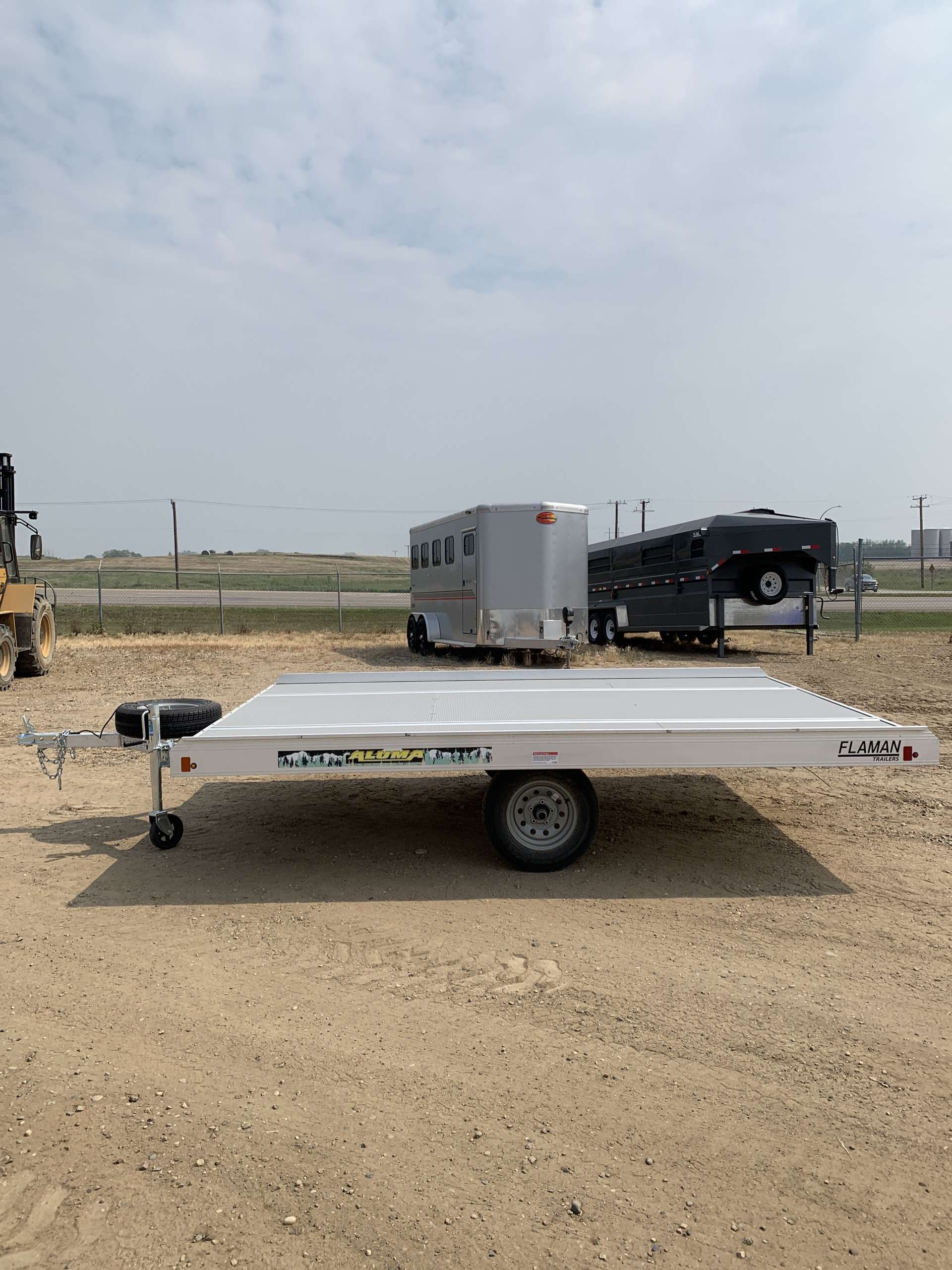 2025 Aluma 8'6" x 12' Tilt Toy Hauler Trailer