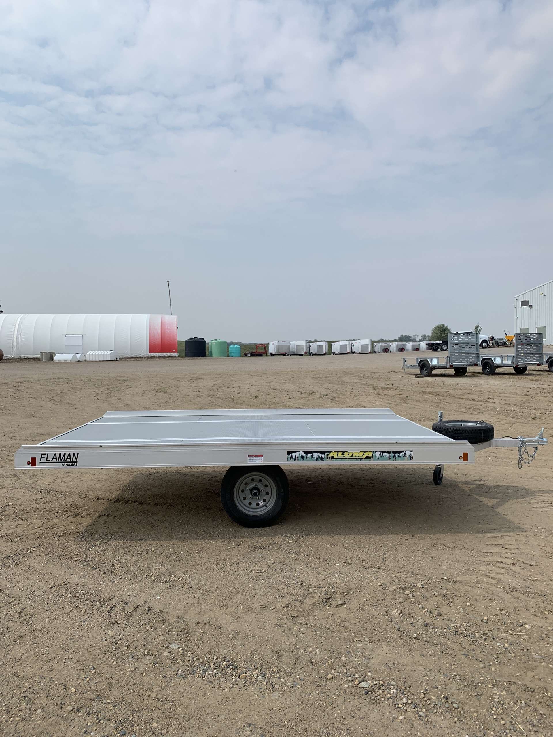 2025 Aluma 8'6" x 12' Tilt Toy Hauler Trailer