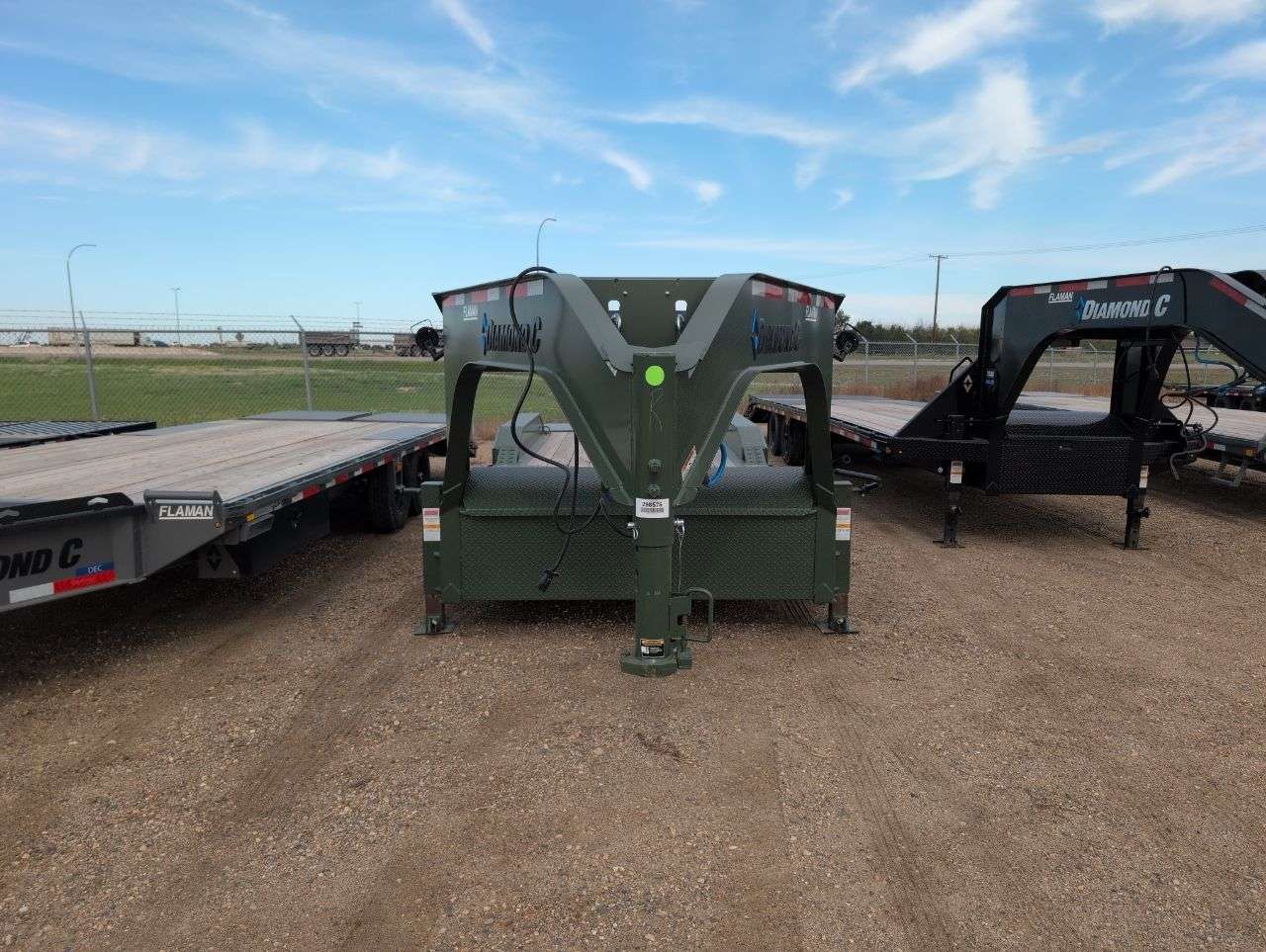 2025 Diamond C LPX 8'6" x 24' GN BT Flat Deck Trailer