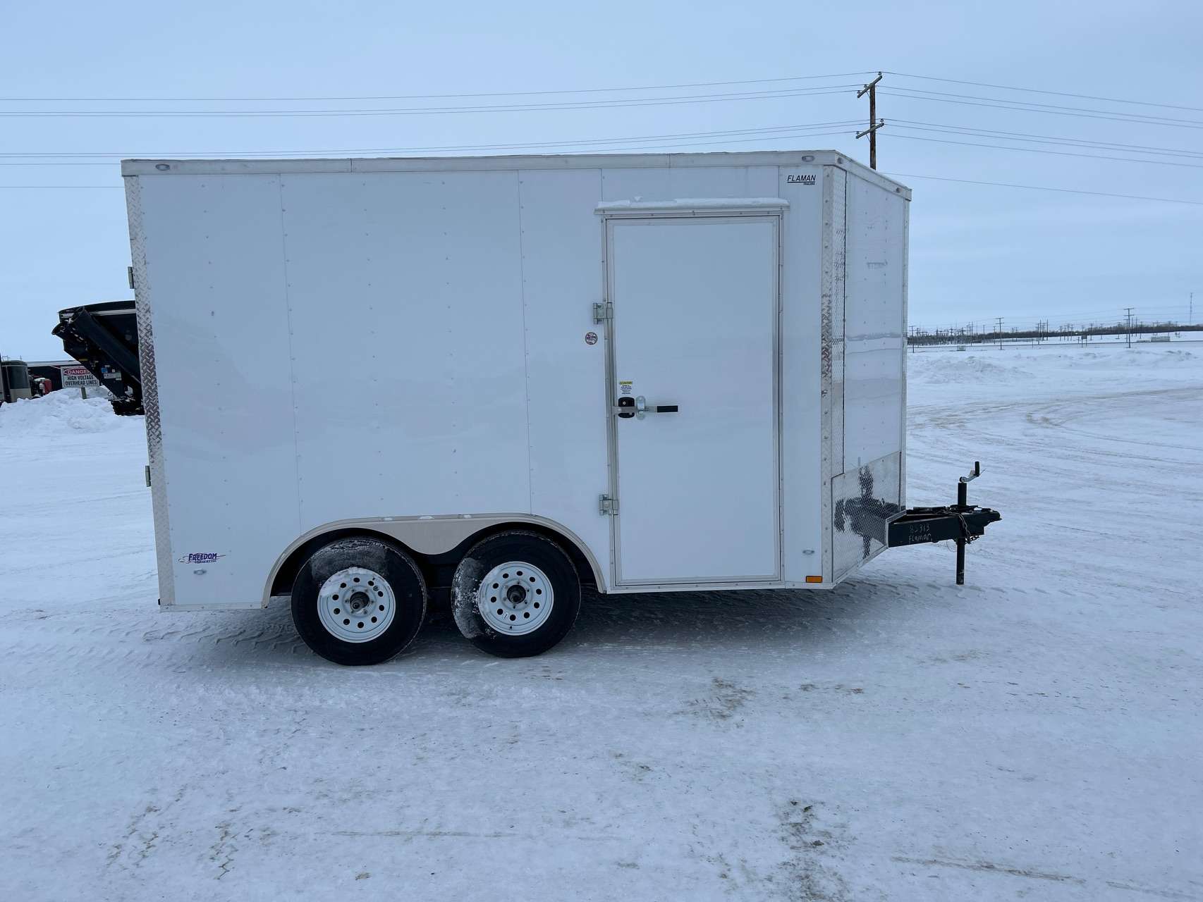 2025 Freedom 8'6" x 12' + V-Nose Enclosed Trailer