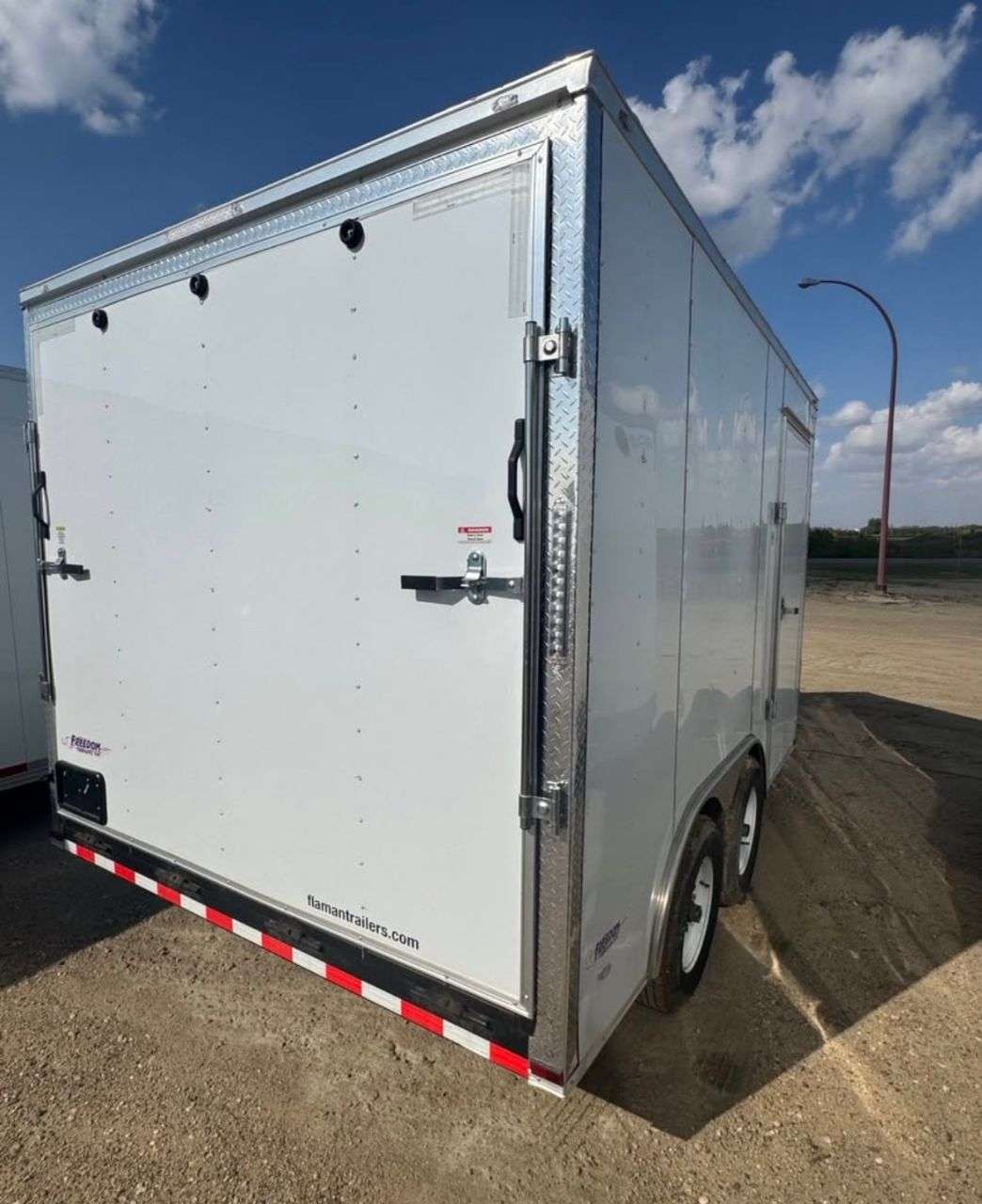 2025 Freedom 8'6" x 12' + V-Nose Enclosed Trailer