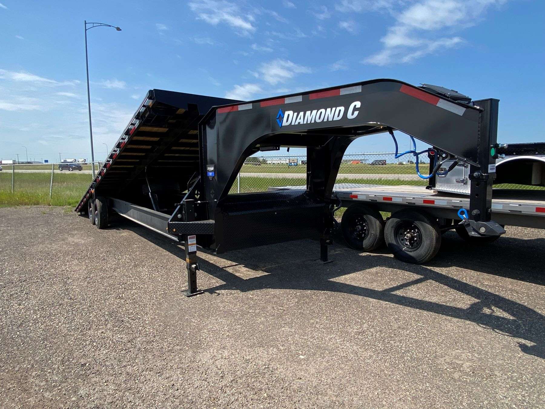 2026 Diamond C DET210- 30' Tilt Deck Gooseneck Trailer