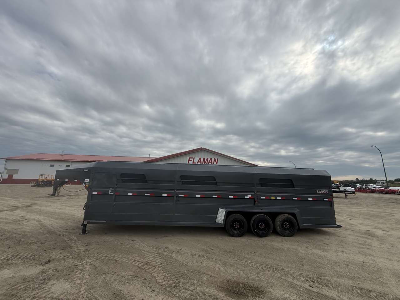 2026 Norbert 7'6" x 30' GN Livestock Triple 8K Trailer