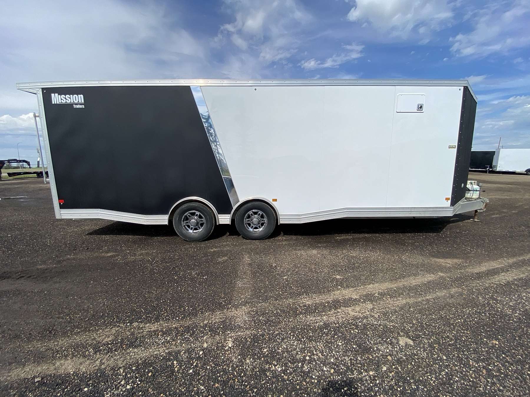 Used 2022 Mission 8.5'x24' Aluminum Enclosed Sled Trailer