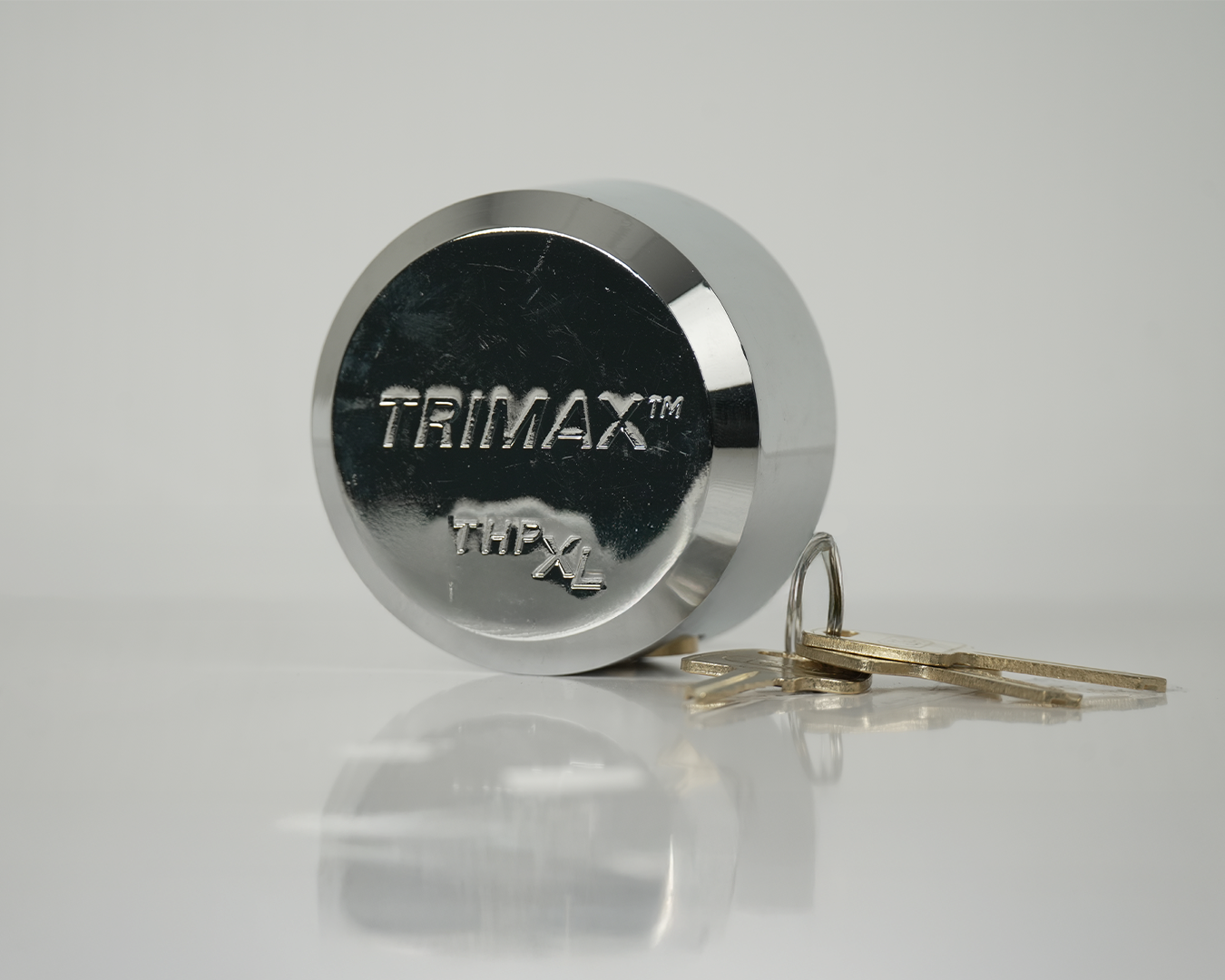 Trimax Puck Lock