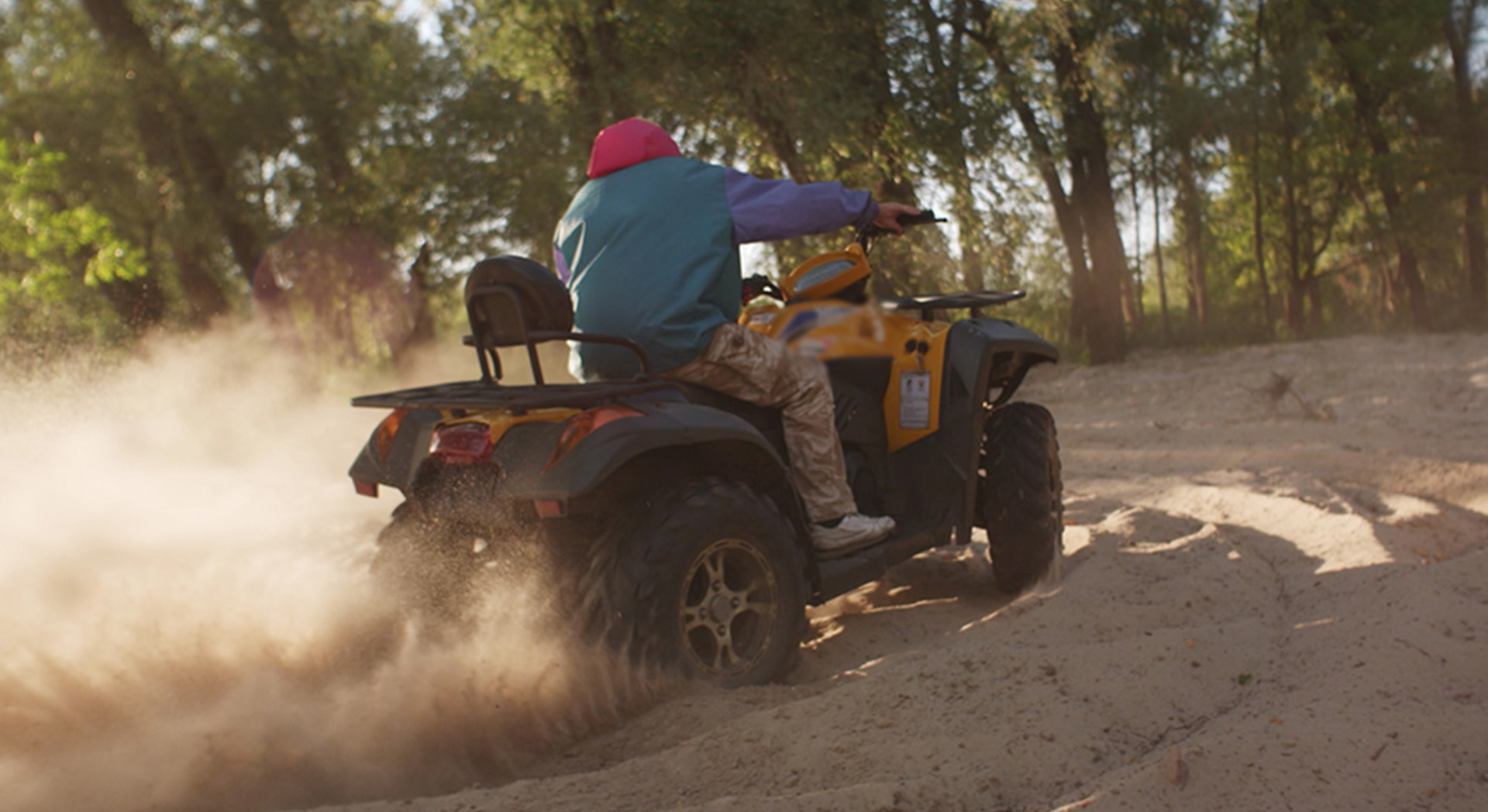 Person Quading on Sand